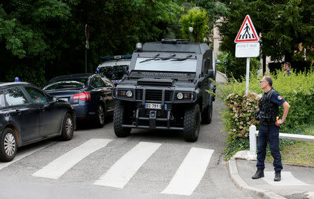 Investigators are seen during a police operation in Oullins, near Lyon, France May 27, 2019. REUTERS/Emmanuel Foudrot