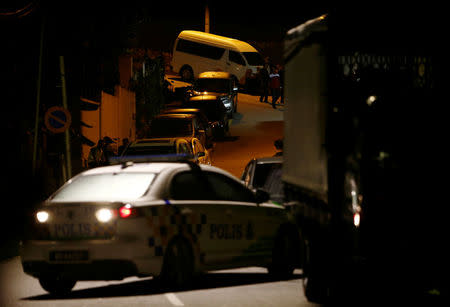 Police arrive at former prime minister Najib Razak's residence in Kuala Lumpur, Malaysia May 16, 2018. REUTERS/Lai Seng Sin