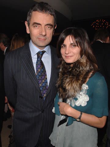 <p>Ian West - PA Images/PA Images/Getty</p> Rowan Atkinson and Sunetra Sastry at the UK premiere of 'Keeping Mum.'