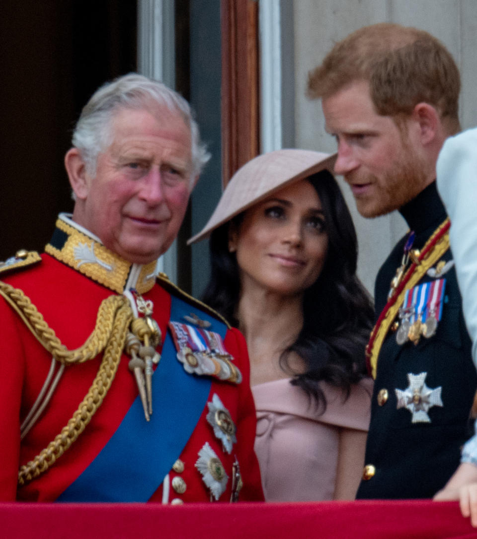 Prince Charles, Prince of Wales with Prince Harry, Duke of Sussex and Meghan, Duchess of Sussex during Trooping The Colour 2018 on June 9, 2018 in London, England.