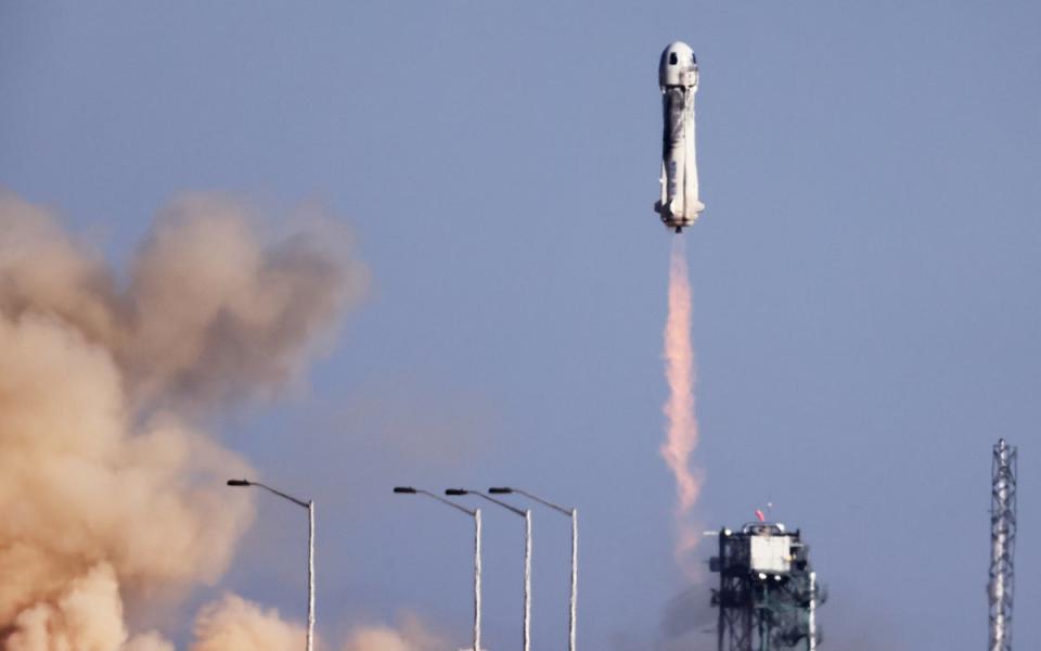 Blue Origin’s rocket New Shepard blasts off carrying Star Trek actor William Shatner, 90, a former Nasa engineer, and a healthcare executive in October 2022 (Mario Tama / Getty Images)