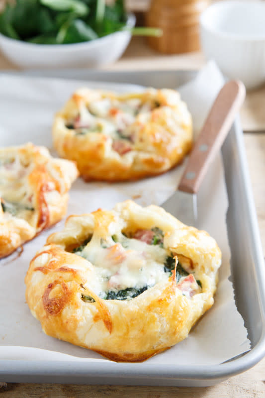<p>Enjoy these ham cheese and spinach breakfast pies for a lovely brunch!</p><p><a href="http://www.runningtothekitchen.com/mini-ham-cheese-and-spinach-breakfast-pies/" rel="nofollow noopener" target="_blank" data-ylk="slk:Get the recipe here!;elm:context_link;itc:0;sec:content-canvas" class="link rapid-noclick-resp"><em><strong>Get the recipe here!</strong></em></a></p>