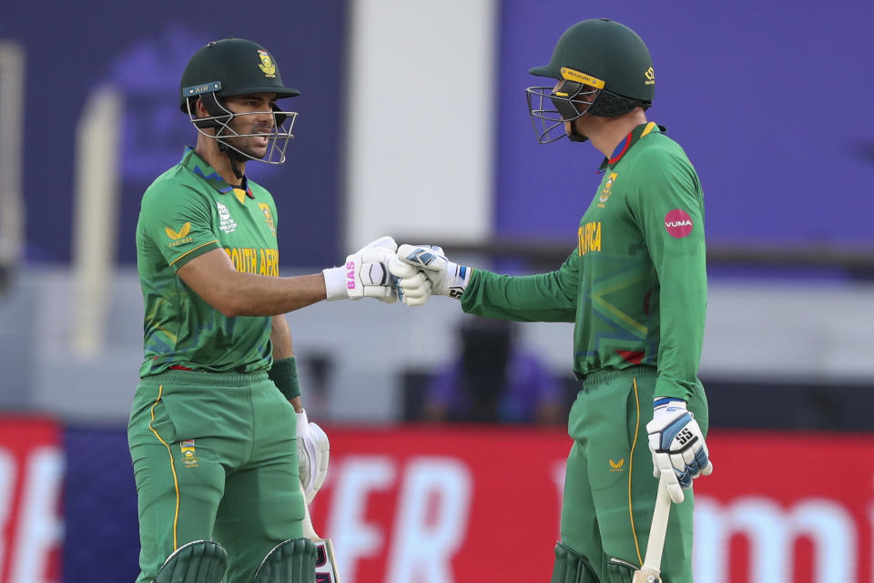 South Africa's Rassie van der Dussen, right, and Reeza Hendricks gesture during the Cricket Twenty20 World Cup match between South Africa and the West Indies in Dubai, UAE, Tuesday, Oct. 26, 2021. (AP Photo/Kamran Jebreili)