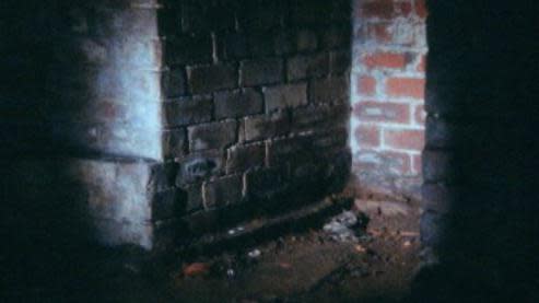 The cellar where the woman's body was found