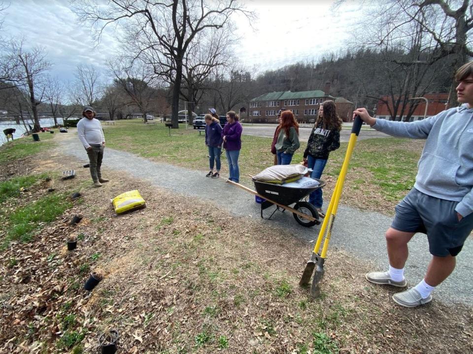 Wildbud Natives owner Nathan Buchanan assisted Madison High students March 8 for the students' work with Mountain Valleys' Love Your Watershed: Cultivating River Stewards of the French Broad Basin project.