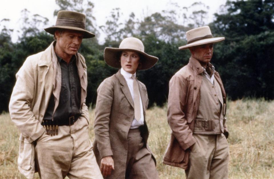 Robert Redford, Meryl Streep and Austrian actor klaus-Maria Brandauer on the set of out of africa