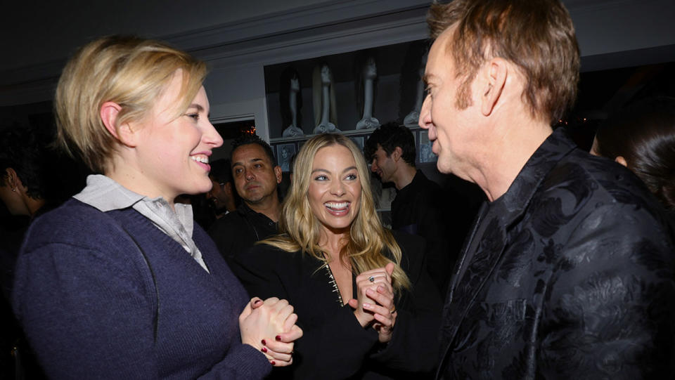 (L-R) Greta Gerwig, Margot Robbie, and Nicolas Cage