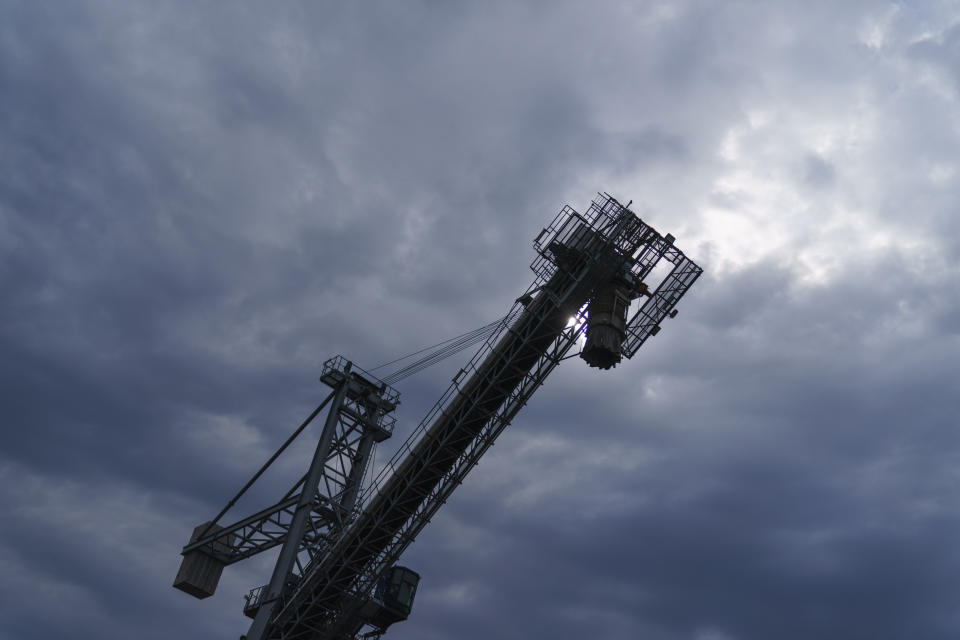 A grain terminal spout stands idle at the Odesa Sea Port, in Odesa, Ukraine, Friday, July 29, 2022. (AP Photo/David Goldman)