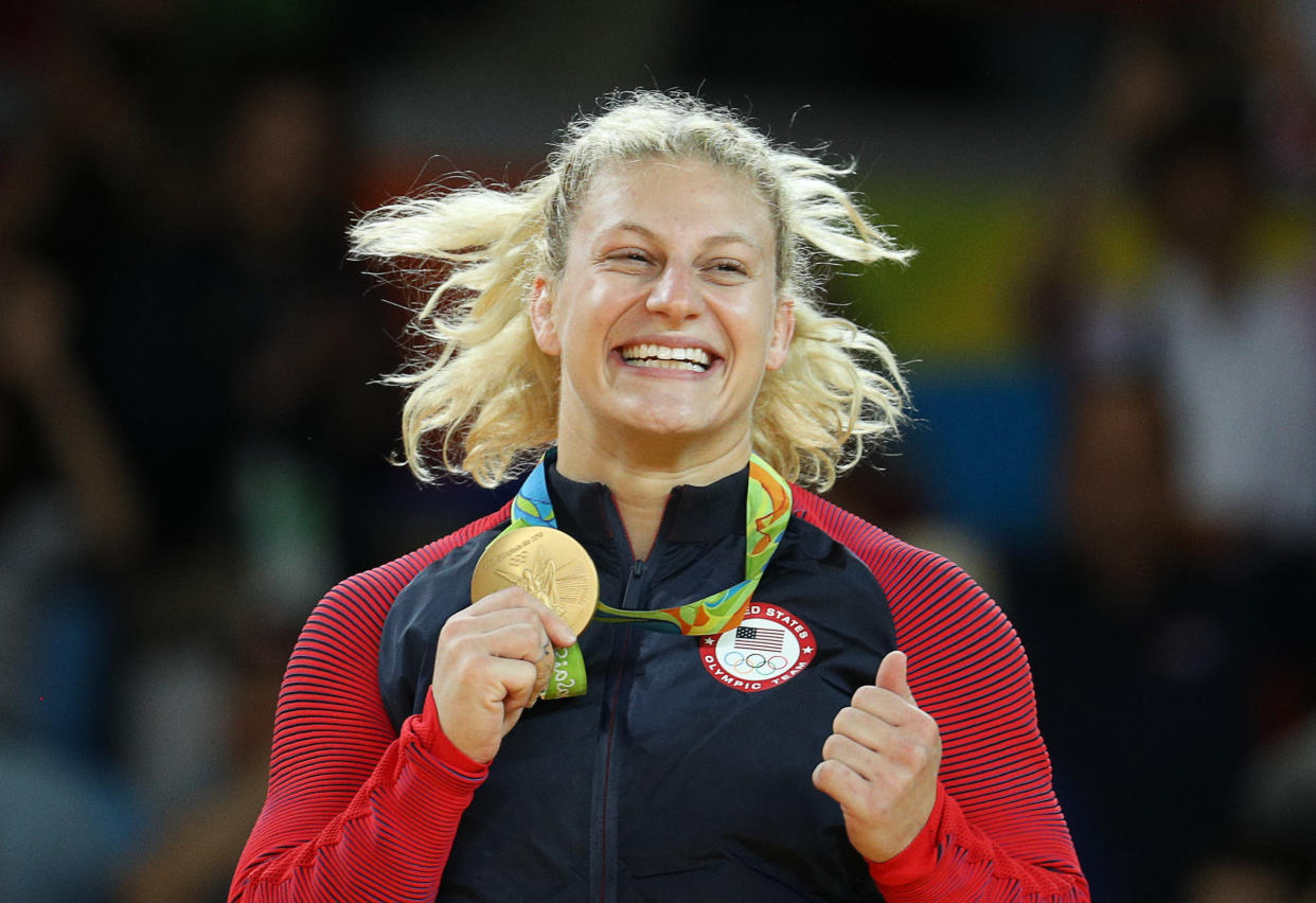 Kayla Harrison poses with her gold medal at the 2016 Rio Olympics. (REUTERS/Stoyan Nenov)