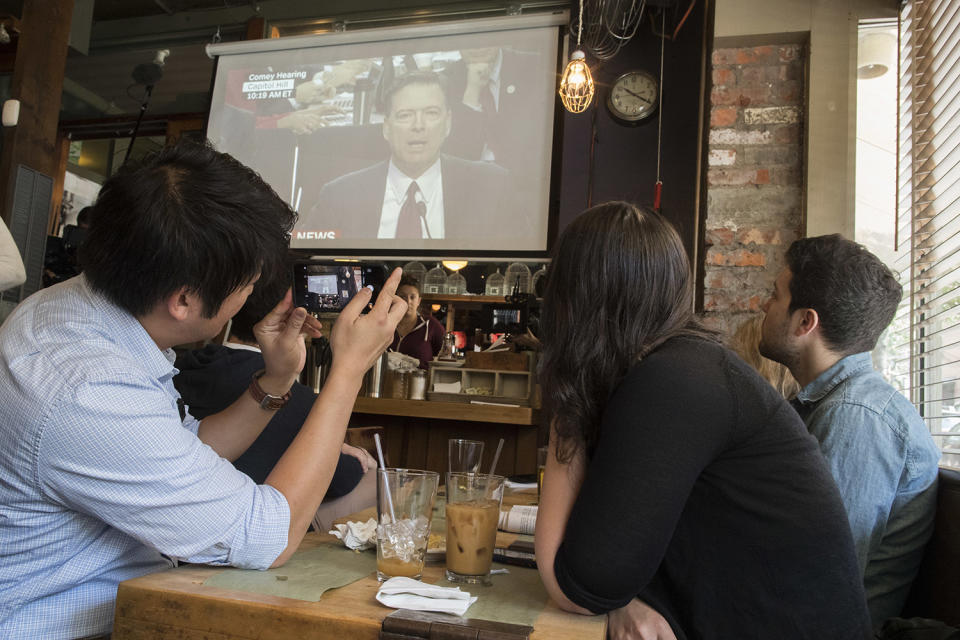 Comey and cocktails: People in bars and restaurants watch ex-FBI director’s testimony