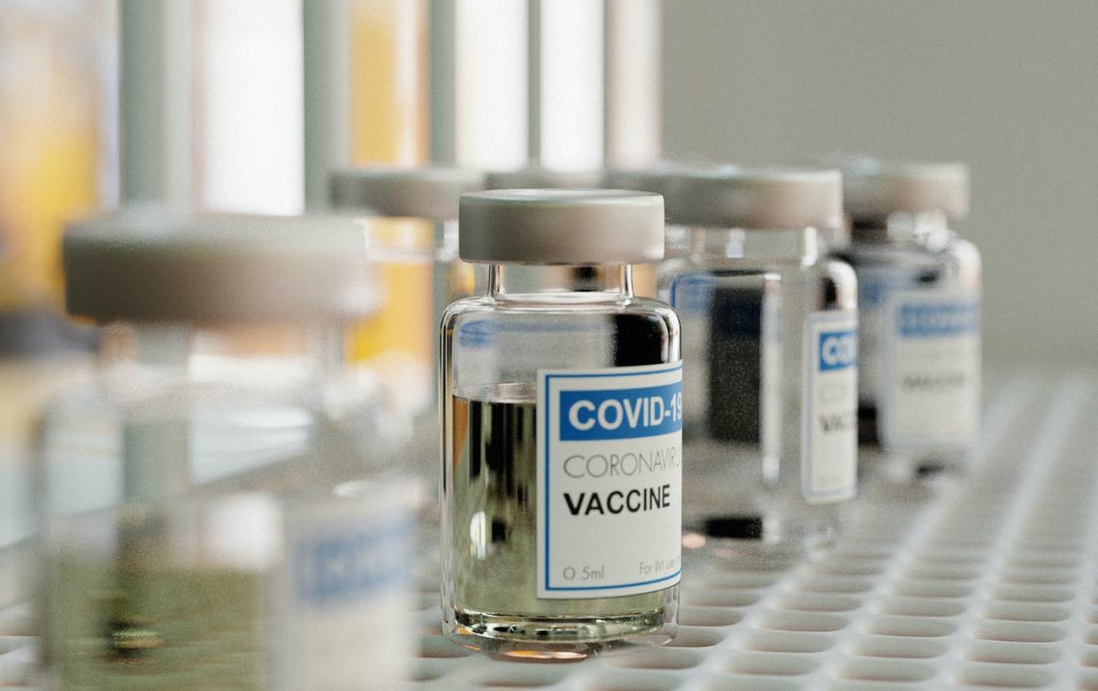 <span class="caption">Dozens of coronavirus vaccines are in clinical trials in the U.S.</span> <span class="attribution"><a class="link " href="https://www.gettyimages.com/detail/photo/coronavirus-vaccine-vials-on-a-laboratory-shelf-royalty-free-image/1301805656?adppopup=true" rel="nofollow noopener" target="_blank" data-ylk="slk:Joao Paulo Burini/Moment via Getty Images;elm:context_link;itc:0;sec:content-canvas">Joao Paulo Burini/Moment via Getty Images</a></span>