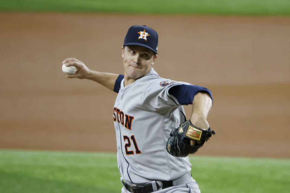 Houston Astros starting pitcher Zack Greinke throws against the Texas Rangers during the first inning of a baseball game Sunday, Aug. 29, 2021, in Arlington, Texas. (AP Photo/Michael Ainsworth)