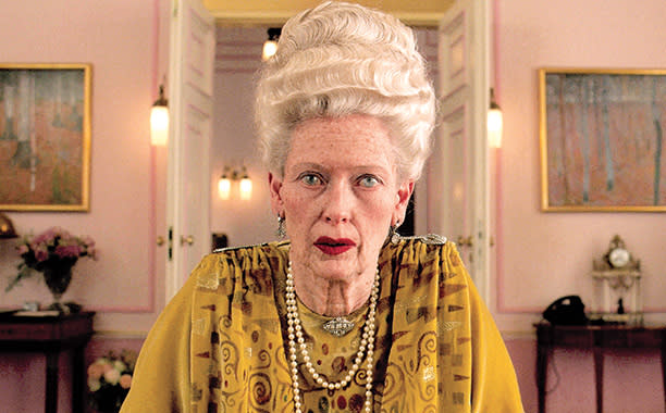 The latest Wes Anderson flick stars Ralph Fiennes, Adrien Brody, Willem Dafoe, Tilda Swinton, Bill Murray and many more big name stars. Swinton definitely has the biggest makeover in the film, seen here. Frances Hannon led the hair and makeup teams.