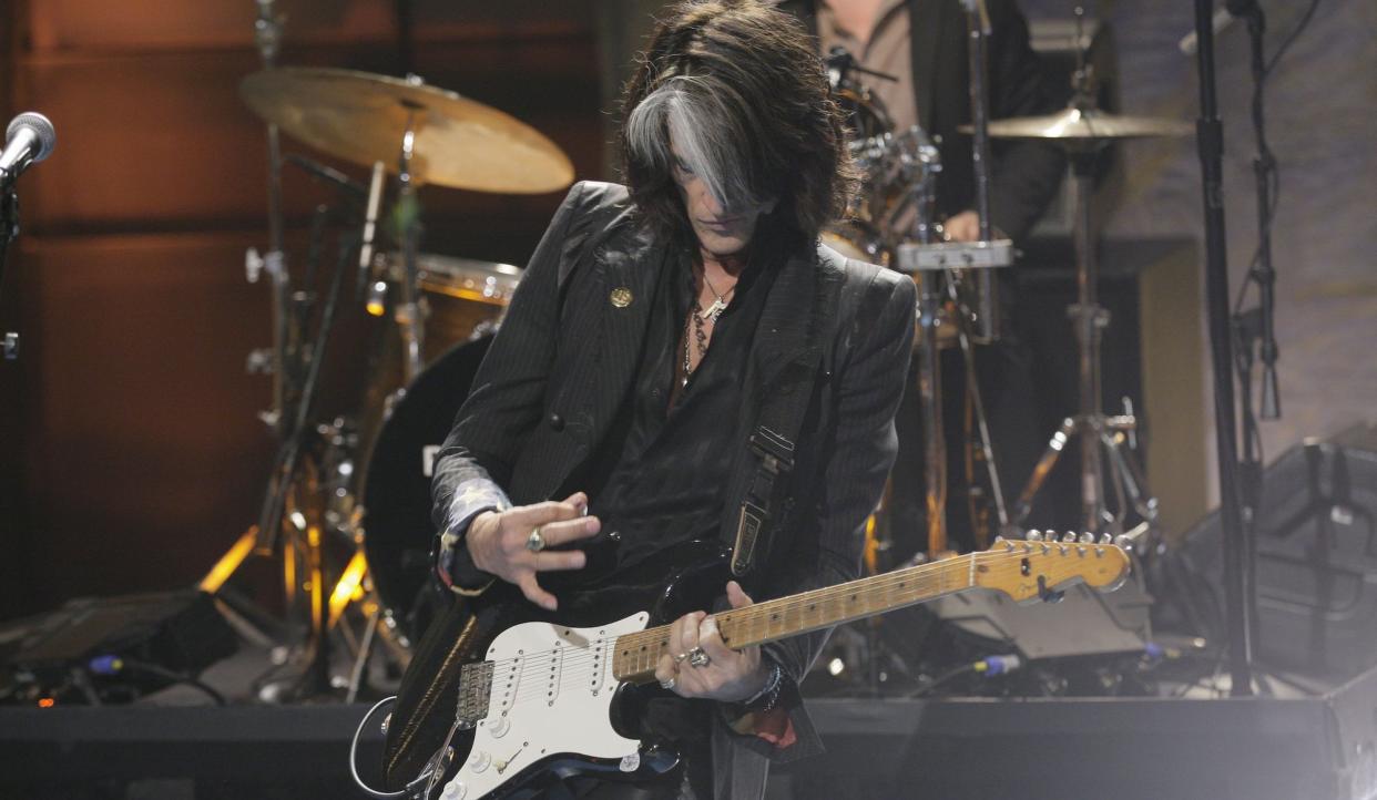  Joe Perry performs on The Tonight Show with Jay Leno on January 30, 2012 