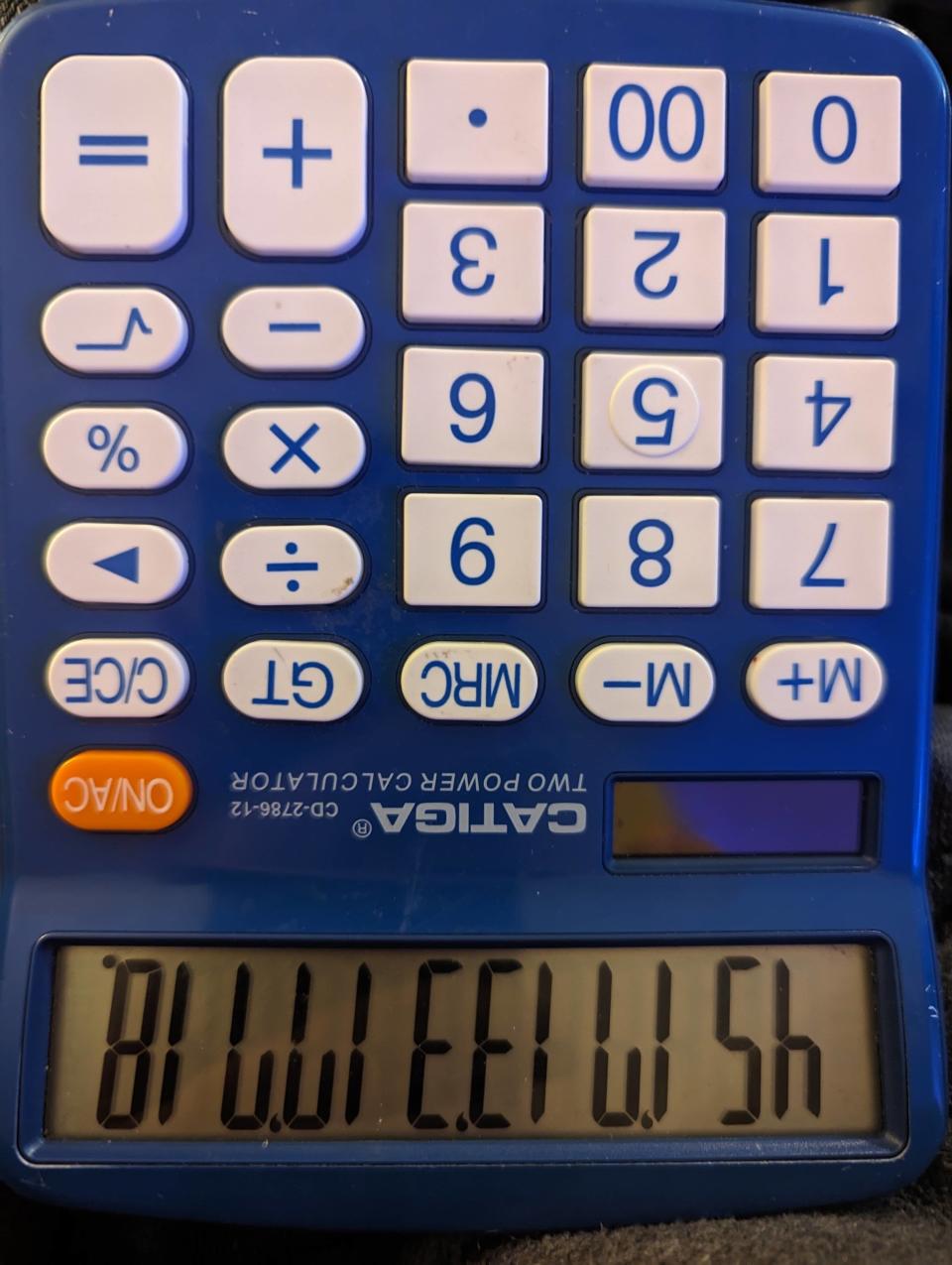 An upside-down calculator with "Billie Eilish" sort of spelled out in all caps