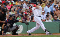 Adrian Gonzalez #28 of the Boston Red Sox knocks in a run in the third inning against the Minnesota Twins in the first inning at Fenway Park August 5, 2012 in Boston, Massachusetts. (Photo by Jim Rogash/Getty Images)