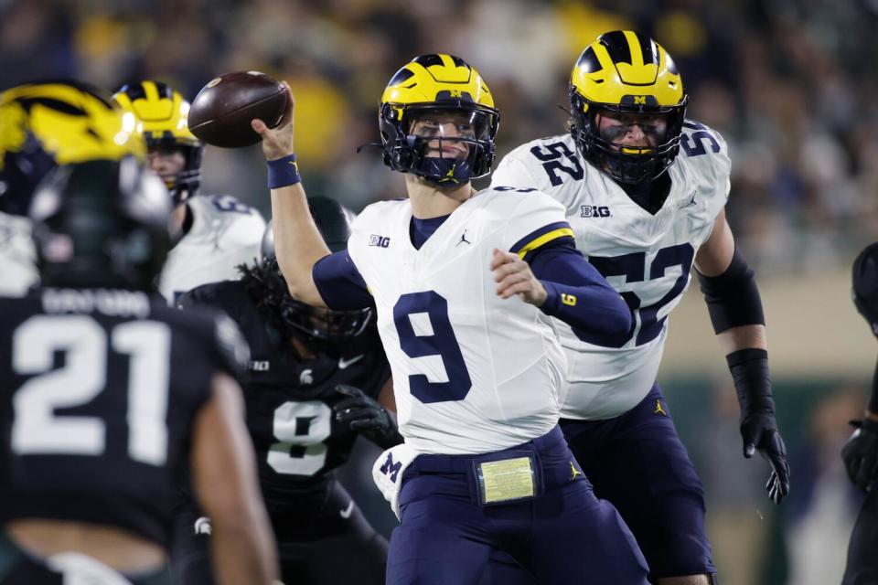 Michigan quarterback J.J. McCarthy throws a pass against Michigan State on Saturday.