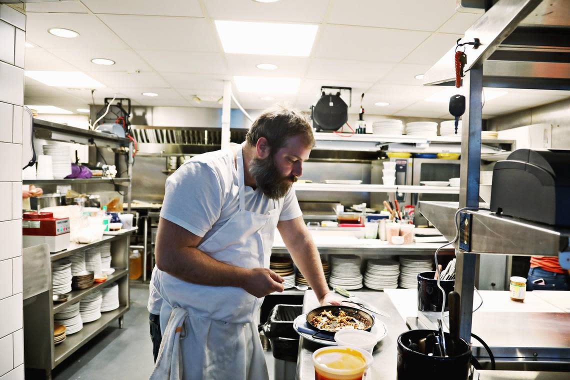 St. James owner and chef Matt Kelly in the Durham seafood restaurant’s kitchen.