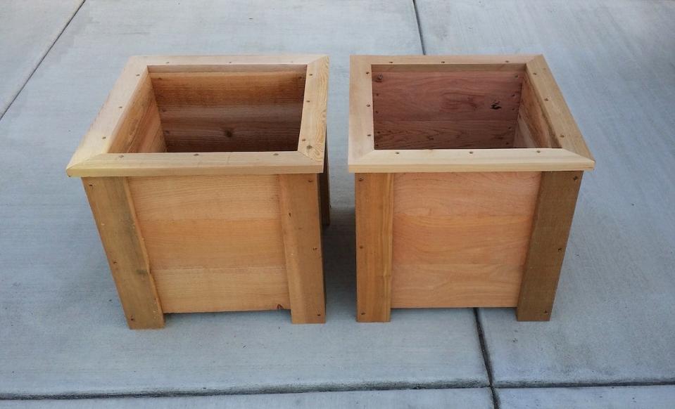 two wooden garden planters