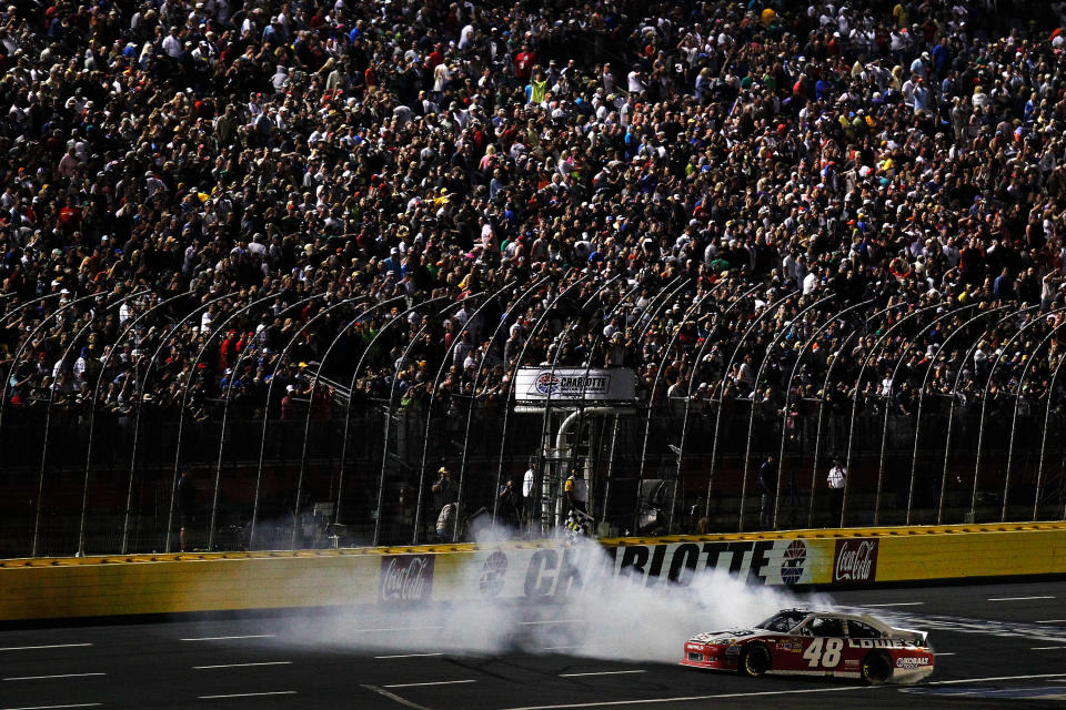 CHARLOTTE, NC - MAY 19: Jimmie Johnson, driver of the #48 Lowe's Patriotic Chevrolet, celebrates with a burnout after winning the NASCAR Sprint All-Star Race at Charlotte Motor Speedway on May 19, 2012 in Charlotte, North Carolina. (Photo by Jeff Zelevansky/Getty Images for NASCAR)