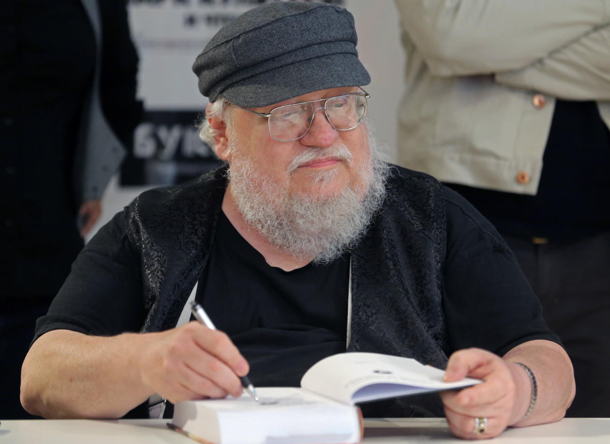 ST PETERSBURG, RUSSIA - AUGUST 17, 2017: George R.R. Martin, an American novelist, author of a series of fantasy novels, A Song of Ice and Fire, adapted into TV series Game of Thrones, signing autographs at a Bukvoyed bookshop. Alexander Demianchuk/TASS (Photo by Alexander Demianchuk\TASS via Getty Images)