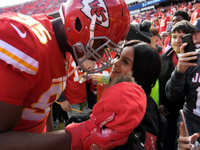 <p>Reed Hoffmann/AP</p> Chris Jones and girlfriend Sheawna Weathersby in the stands before an NFL football game against the Minnesota Vikings in Kansas City, Missouri on November 3, 2019.