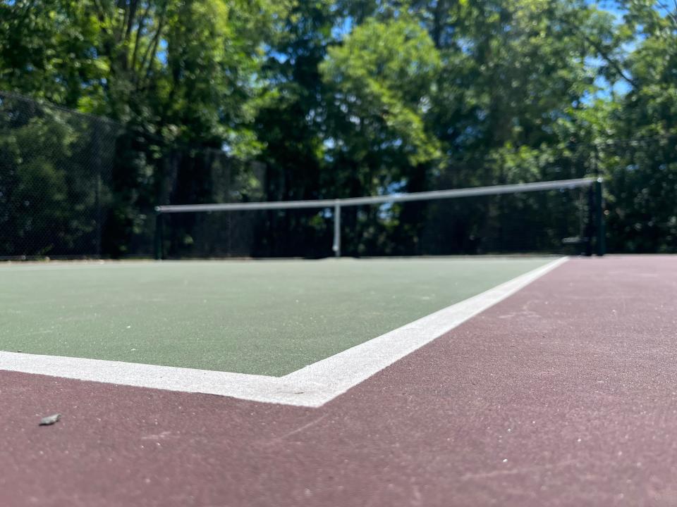 Schmanska Park on Grove Street has a single pickleball court in its fenced-in tennis court area. The park is in the Old East End of Burlington, near the Winooski Bridge.