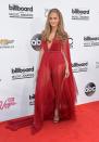 <p>Lopez worked the Billboard Music Awards red carpet in a red cape dress. </p>