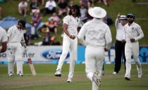 India's Ishant Sharma (2nd L) celebrates the dismissal of New Zealan's Peter Fulton during day one of the second international test cricket match at the Basin Reserve in Wellington, February 14, 2014.
