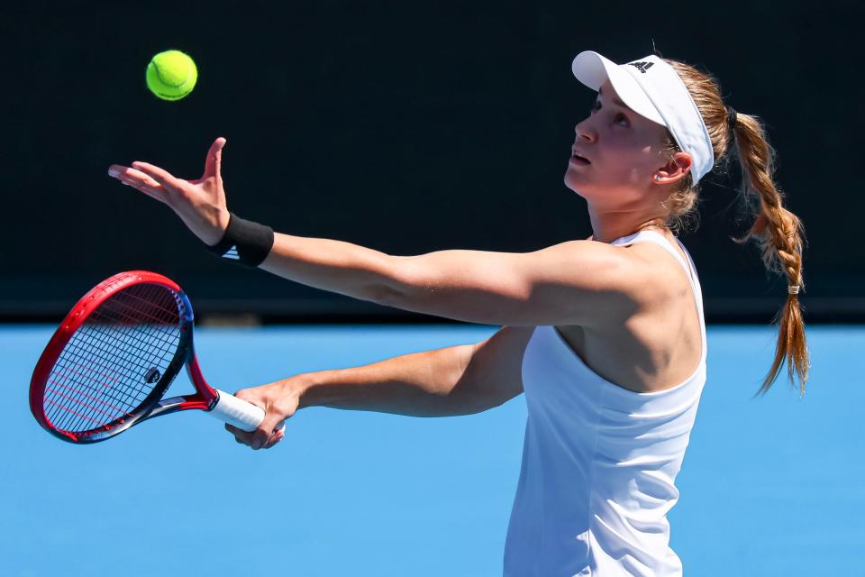 Elena Rybakina prepares to serve.