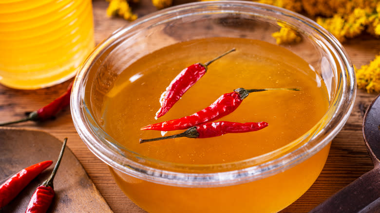 Bowl of honey with chilies