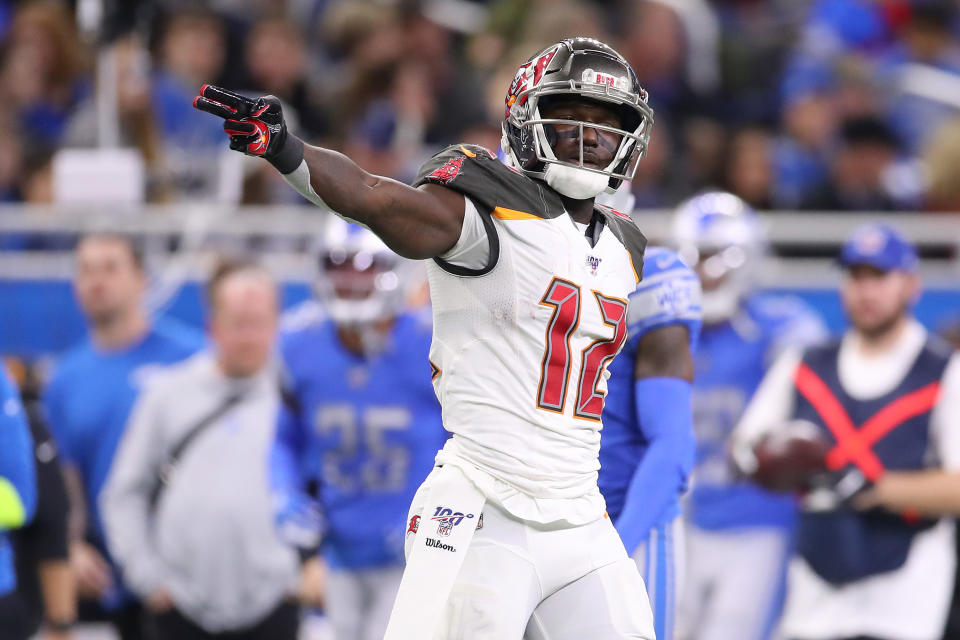 Chris Godwin #12 of the Tampa Bay Buccaneers signals a first down 