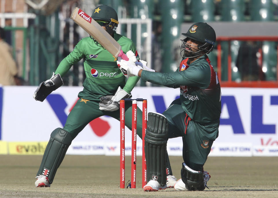 Bangladesh batsman Tamim Iqbal plays against Pakistan at the Gaddafi Stadium in Lahore, Pakistan, Friday, Jan. 24, 2020. Pakistan and Bangladesh are playing their first T20 of the three matches series under tight security. (AP Photo/K.M. Chaudary)