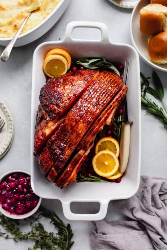 <p>Platings and Pairings</p><p>This glazed ham recipe is made with brown sugar, mustard, pineapple and honey, this glaze makes an addictive and moist ham every time. It will be the star of your holiday dinner!</p><p><strong>Get the recipe: <a href="https://www.platingsandpairings.com/brown-sugar-mustard-glazed-ham-recipe/" rel="nofollow noopener" target="_blank" data-ylk="slk:Brown Sugar Mustard Glazed Ham;elm:context_link;itc:0;sec:content-canvas" class="link rapid-noclick-resp">Brown Sugar Mustard Glazed Ham</a></strong></p>