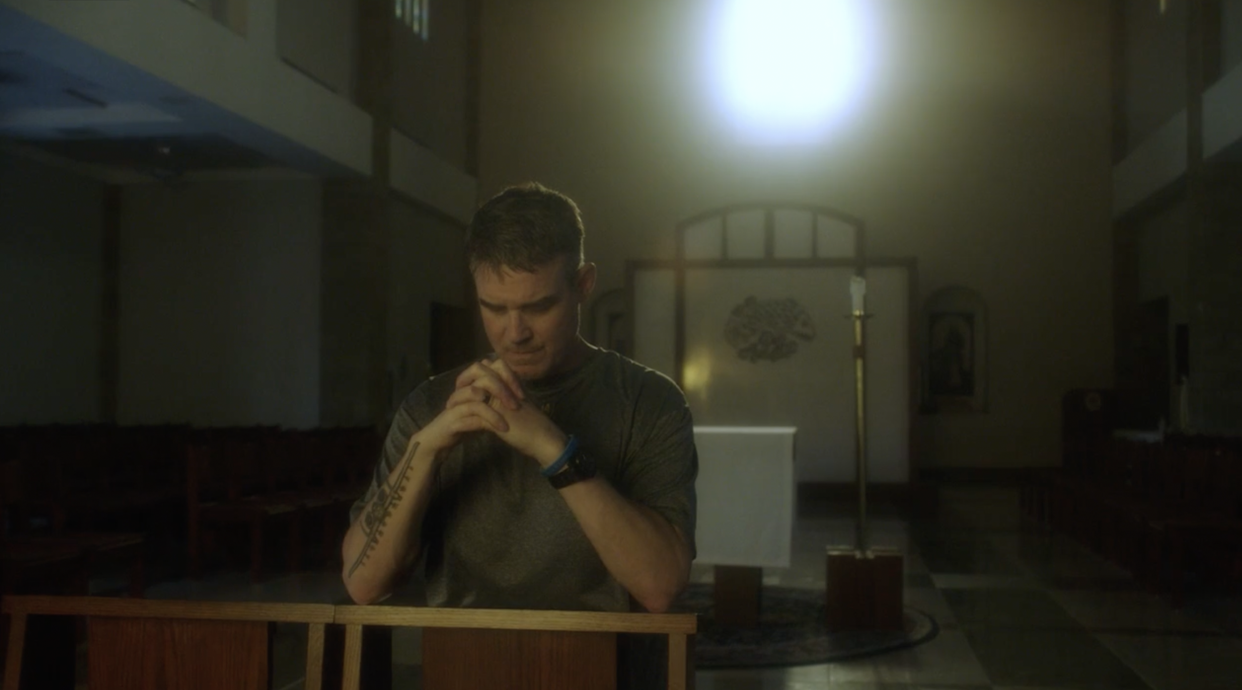 North Canton native and actor Eddie McClintock prays during a scene in "Miracle at Manchester," a movie about a teen boy diagnosed with a rare form of brain cancer. The film will be shown Saturday and Sunday at Canton Palace Theatre.