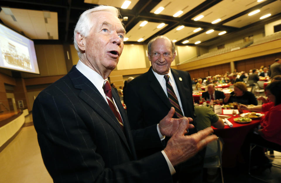 This photo taken Feb. 20, 2014 shows Sen. Thad Cochran, R-Miss., left, accompanied by friend and state Rep. Ray Rogers, R-Pearl, speaking at the city of Pearl's Chamber of Commerce Awards Banquet in Pearl, Miss. Cochran is engaged in his toughest campaign in a generation. The former Appropriations Committee chairman faces a June 3 primary challenge from a two-term state lawmaker. Chris McDaniel riles up tea party voters by denouncing big federal spending and portraying the 76-year-old incumbent as a Washington insider who’s lost touch with folks back home. (AP Photo/Rogelio V. Solis)