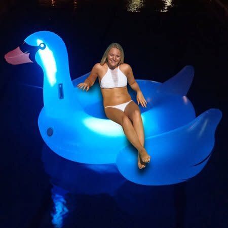 Swimline Giant LED Light-Up Swan Float (Photo: Amazon)