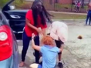 A mailwoman was beaten and dragged across the ground in a fight allegedly about stimulus checks in Flint, Michigan.  (Chuck Glo/Instagram)