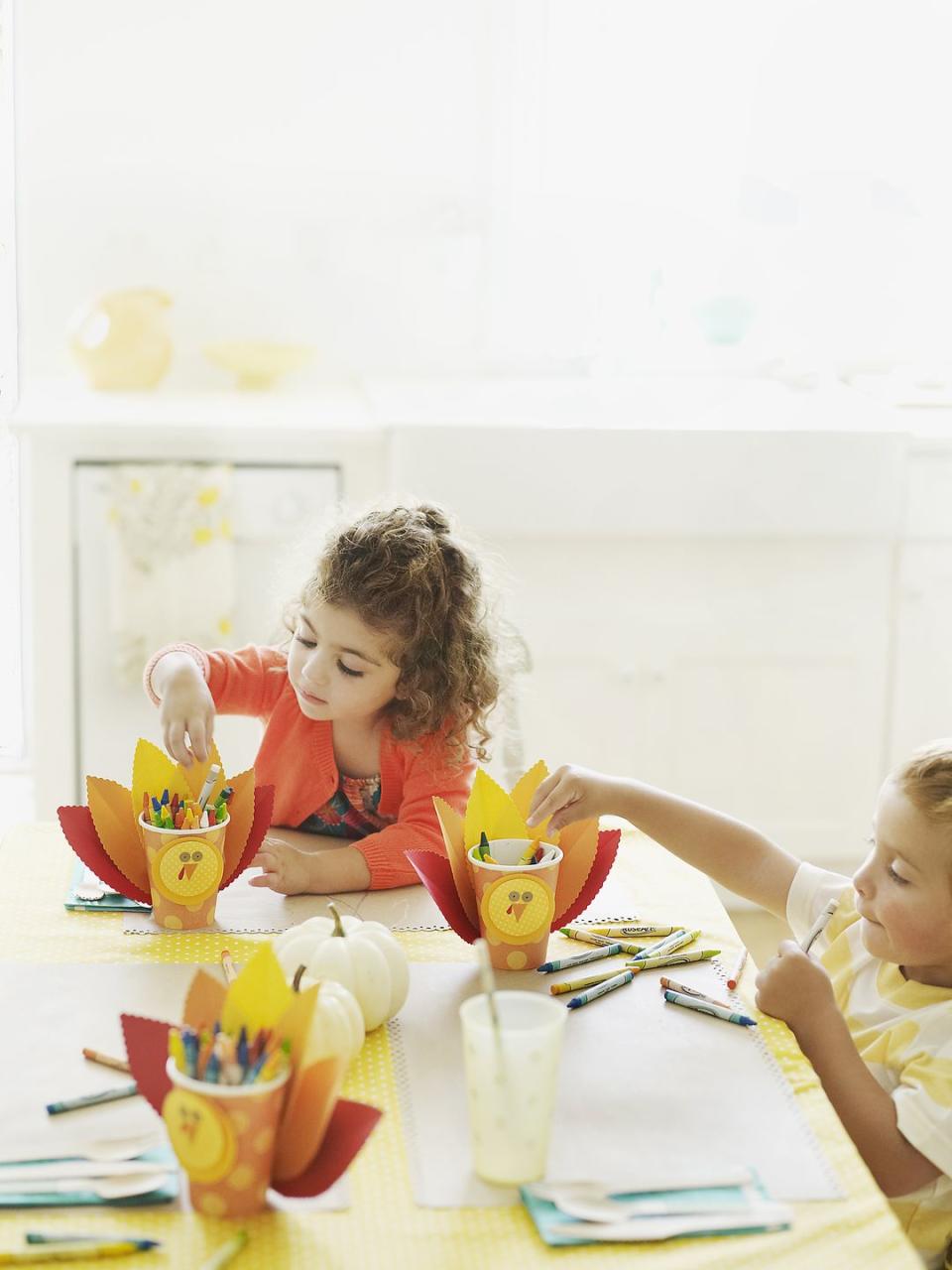 <p>Need something to do while the turkey cooks? Try an arts and crafts project. Making something as simple as a handprint turkey will keep the kids occupied. Not to mention, it'll be a cute keepsake for years to come. </p><p><strong>RELATED: </strong><a href="https://www.goodhousekeeping.com/holidays/thanksgiving-ideas/g2907/thanksgiving-kids-crafts/" rel="nofollow noopener" target="_blank" data-ylk="slk:42 Easy Thanksgiving Crafts for Kids;elm:context_link;itc:0;sec:content-canvas" class="link ">42 Easy Thanksgiving Crafts for Kids</a></p>