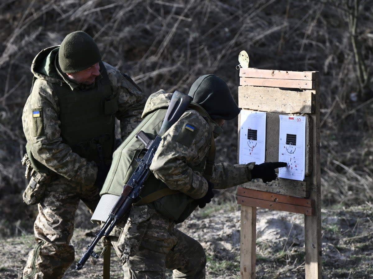 Ukrainian servicemen of the 42nd Mechanised Brigade take part in a field military exercise in the Donetsk region on 6 December 2023 (AFP via Getty Images)