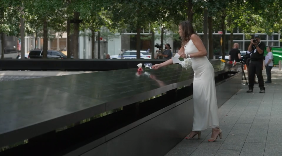 Monica Iken wore her wedding dress to the 9/11 Memorial in memory of her husband who was killed in the attacks.  / Credit: CBS News