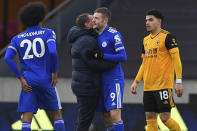 Leicester's manager Brendan Rodgers embraces Leicester's Jamie Vardy at the end of the English Premier League match between Wolves and Leicester City at the Molineux Stadium in Wolverhampton, England Sunday, Feb. 7, 2021. (Justin Tallis/Pool via AP)