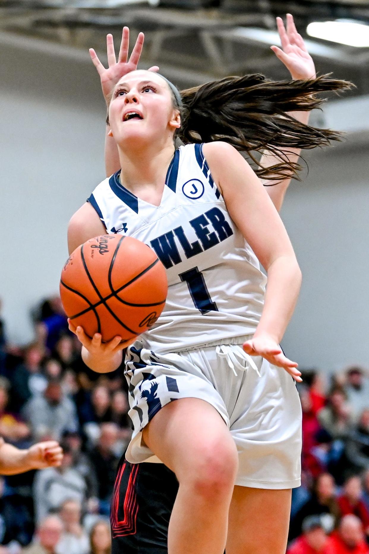 Fowler's Emma Riley scores against Kingston during the third quarter on Tuesday, March 14, 2023, at Elisabeth Ann Johnson Memorial High School in Mt. Morris.