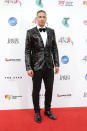 <p><b>Nathaniel</b> is definitely living louder in this sequinned tux jacket on the ARIAs red carpet.</p>