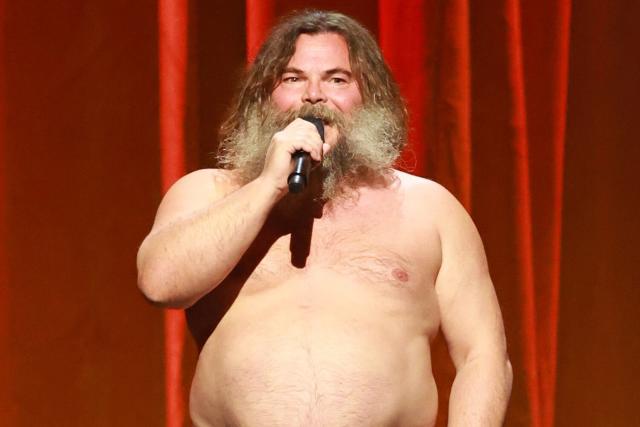 Jack Black flaunts his flexibility and his underwear while singing