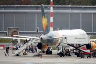 Passengers disembark a Boeing 757-300 of Condor Airlines after landing at Duesseldorf Airport