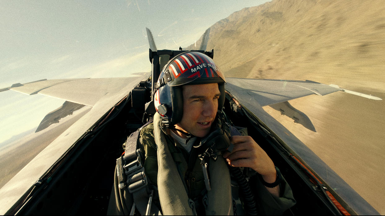  Tom Cruise flying a jet in Top Gun: Maverick 