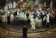 <p>Russian Orthodox believers gather to kiss the relics of Saint Nicholas in the Christ the Savior Cathedral in Moscow, Russia, Sunday, May 21, 2017. Relics of Saint Nicholas, one of the Russian Orthodox Church’s most revered figures, arrived in Moscow on Sunday from an Italian church where they have lain for 930 years. An icon of of Saint Nicholas in in the center. (Photo: Alexander Zemlianichenko/AP) </p>