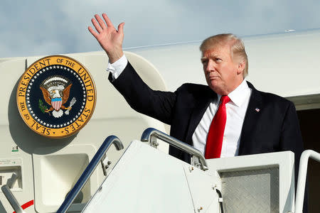U.S. President Donald Trump waves as he arrives at Morristown municipal airport for a weekend at the Trump National Golf Club in Bedminster ahead of next week's United Nations General Assembly, New Jersey, U.S., September 15, 2017. REUTERS/Yuri Gripas