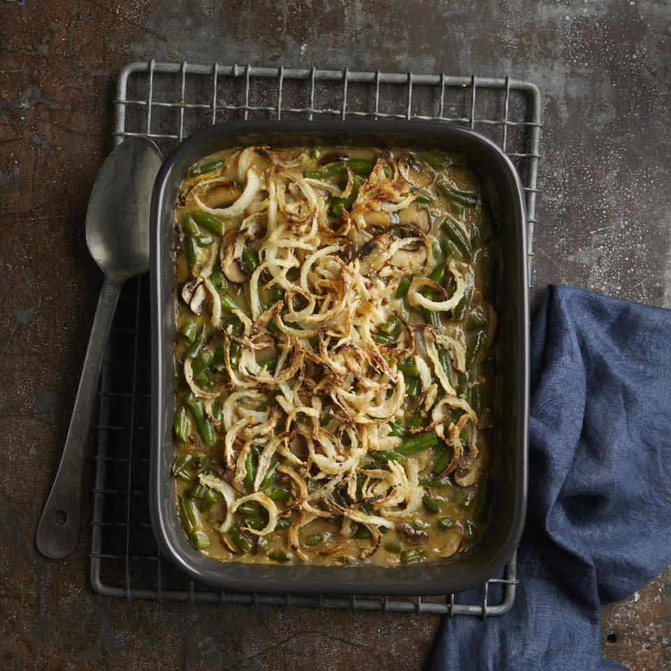 <p>Now everyone can enjoy classic Thanksgiving favorites, like this dairy-free green bean casserole. We make a homemade vegan cream of mushroom soup using almond milk for the creamy base that's combined with fresh green beans. Top it off with classic french-fried onions (we have a vegan recipe for that, too!) for a side dish everyone will devour. <a href="https://www.eatingwell.com/recipe/268410/vegan-green-bean-casserole/" rel="nofollow noopener" target="_blank" data-ylk="slk:View Recipe;elm:context_link;itc:0;sec:content-canvas" class="link ">View Recipe</a></p>